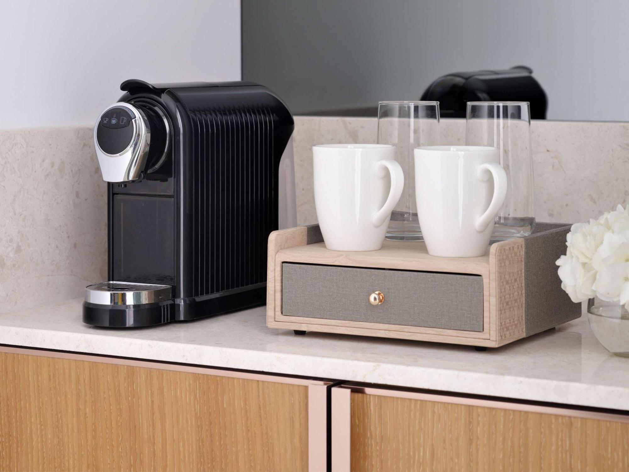 Moevenpick Hotel & Apartments Ghala Μουσκάτ Εξωτερικό φωτογραφία A Nespresso coffee machine